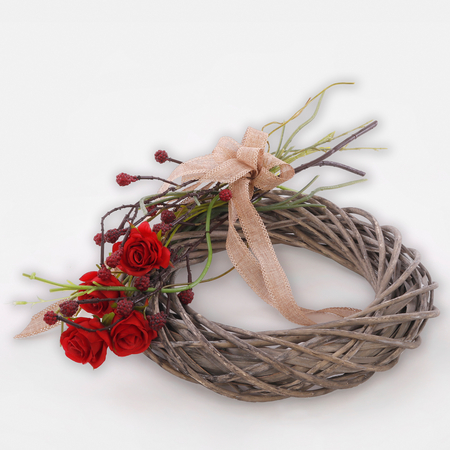 Natural peeled wicker ring with a rose